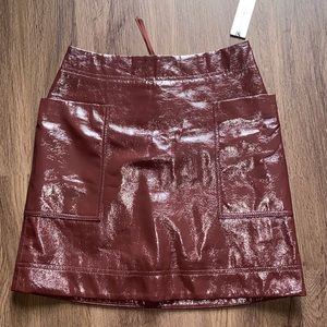 anthropologie patent maroon skirt